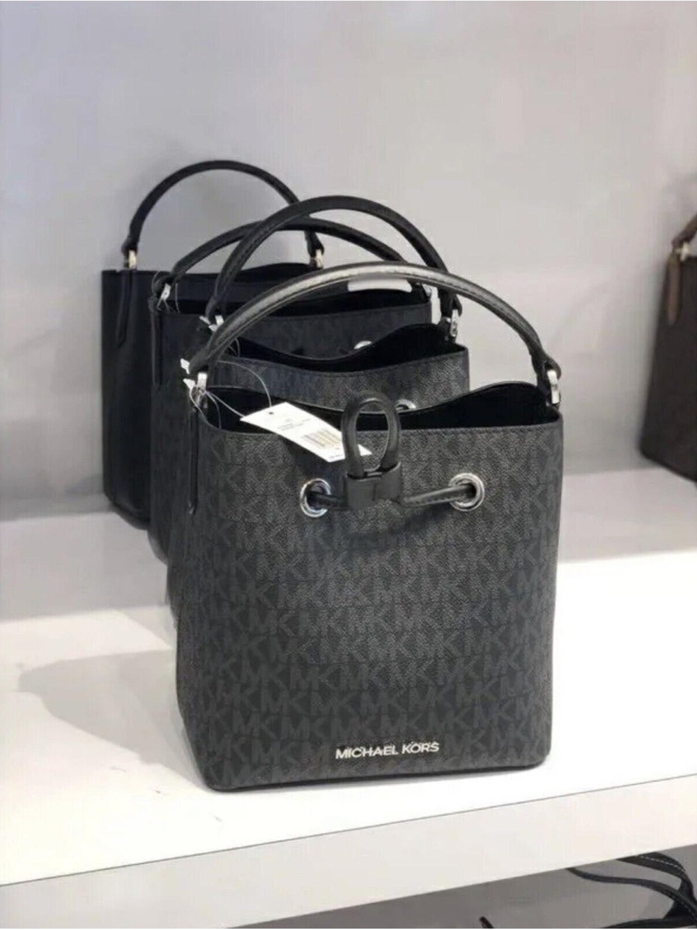 Michael Kors Gray MK Monogram Drawstring Bucket Bag